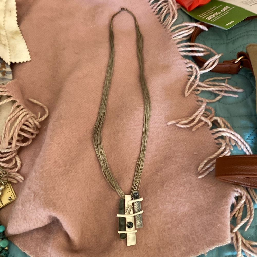 Sterling silver string necklace and a silver with multi beaded stone pendant